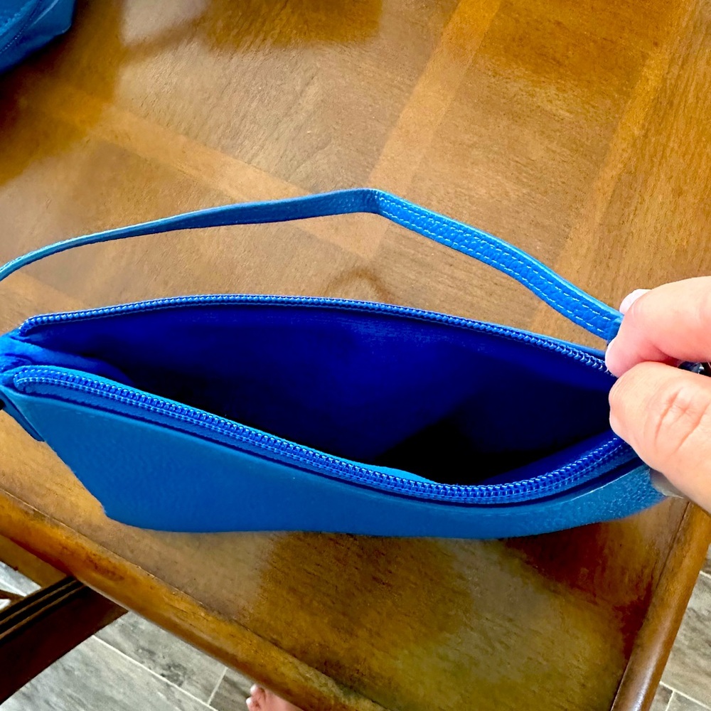 Beck brand leather wristlet in cobolt blue